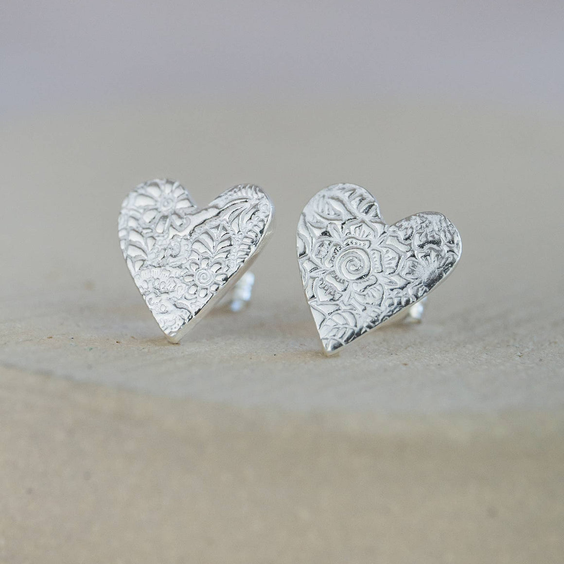 STERLING SILVER TEXTURED HEART STUDS